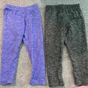 Dori creation leggings.  2 pairs. Black and purple. Size 18/24 months